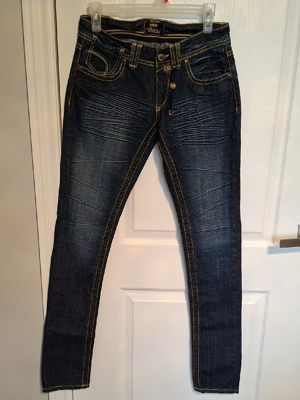 Akademiks Dark Blue Denimβ Jeans with Yellow Stitching